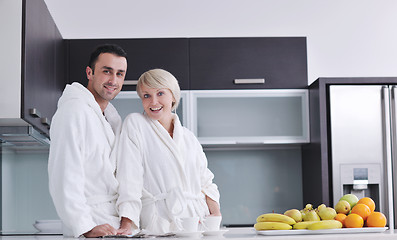 Image showing young couple have fun in modern kitchen