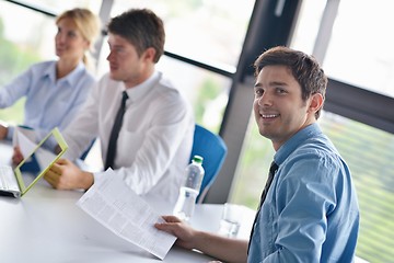 Image showing business people in a meeting at office