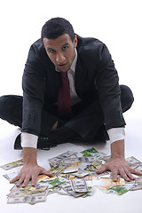 Image showing Business man holding money