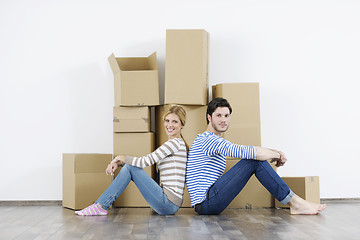 Image showing Young couple moving in new home