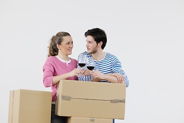 Image showing Young couple moving in new home