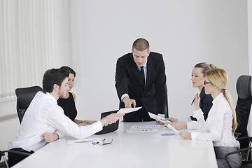 Image showing business people in a meeting at office