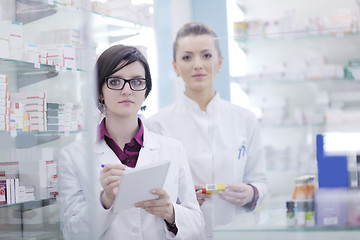 Image showing team of pharmacist chemist woman  in pharmacy drugstore