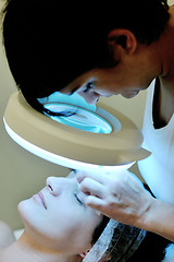 Image showing woman with facial mask in cosmetic studio