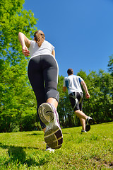 Image showing Young couple jogging