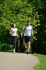 Image showing Young couple jogging at morning