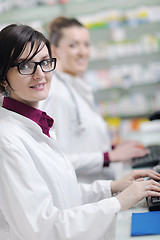 Image showing team of pharmacist chemist woman  in pharmacy drugstore