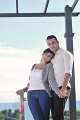 Image showing couple relaxing on balcony