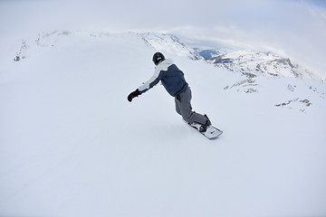 Image showing skiing on fresh snow at winter season at beautiful sunny day