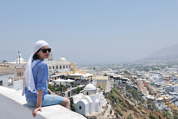 Image showing Greek woman on the streets of Oia, Santorini, Greece