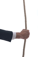 Image showing business man with rope isolated on white background