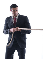 Image showing business man with rope isolated on white background