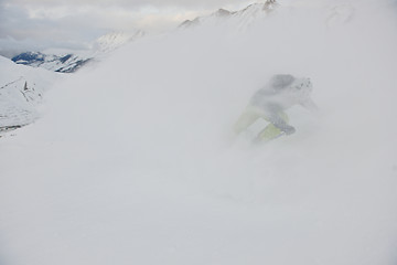 Image showing skiing on fresh snow at winter season at beautiful sunny day