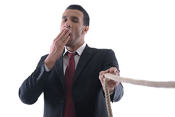 Image showing business man with rope isolated on white background