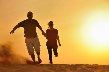 Image showing couple enjoying the sunset