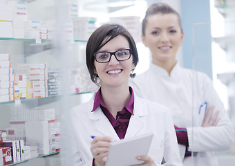 Image showing team of pharmacist chemist woman  in pharmacy drugstore