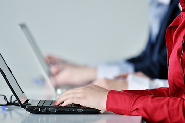 Image showing business woman group with headphones