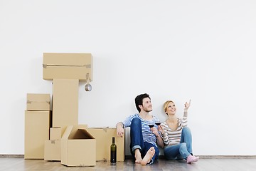 Image showing Young couple moving in new house