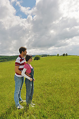 Image showing Portrait of romantic young couple smiling together outdoor