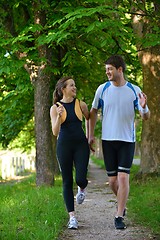 Image showing Young couple jogging