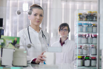 Image showing team of pharmacist chemist woman  in pharmacy drugstore