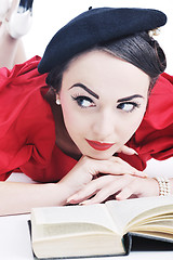 Image showing beautiful young woman read book