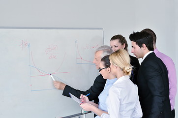 Image showing Senior business man giving a presentation