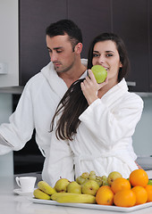 Image showing young couple have fun in modern kitchen