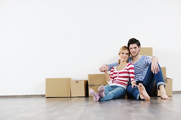 Image showing Young couple moving in new house