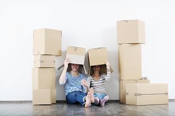 Image showing Young couple moving in new house