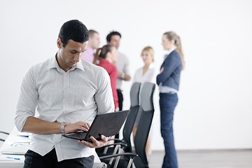 Image showing young business man at meeting