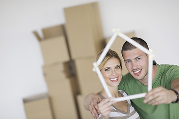 Image showing Young couple moving in new home