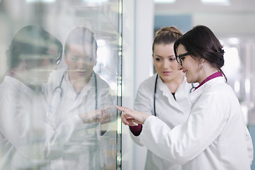 Image showing team of pharmacist chemist woman  in pharmacy drugstore