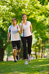 Image showing Young couple jogging