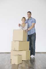 Image showing Young couple moving in new home