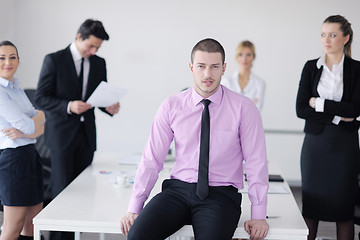 Image showing young business man at meeting