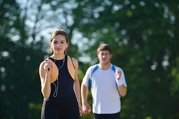 Image showing Young couple jogging at morning