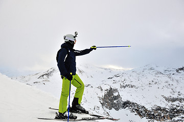 Image showing skiing on fresh snow at winter season at beautiful sunny day