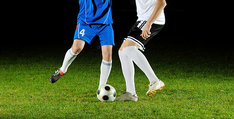 Image showing football players in action for the ball