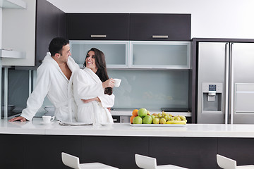 Image showing young couple have fun in modern kitchen