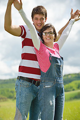 Image showing Portrait of romantic young couple smiling together outdoor