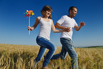 Image showing happy couple in wheat field