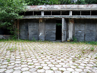 Image showing Empty crumbling industrial warehouse