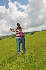 Image showing Portrait of romantic young couple smiling together outdoor