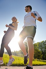 Image showing Young couple jogging