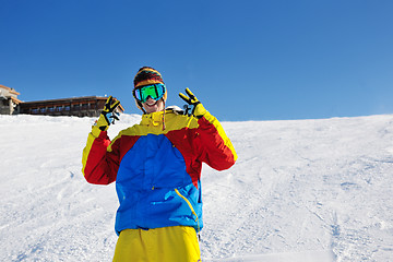 Image showing skiing on fresh snow at winter season at beautiful sunny day