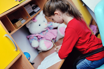 Image showing girl doing homework