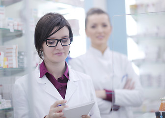 Image showing team of pharmacist chemist woman  in pharmacy drugstore