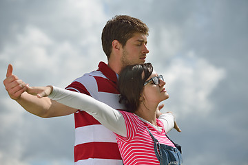 Image showing Portrait of romantic young couple smiling together outdoor