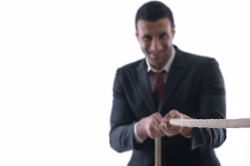 Image showing business man with rope isolated on white background